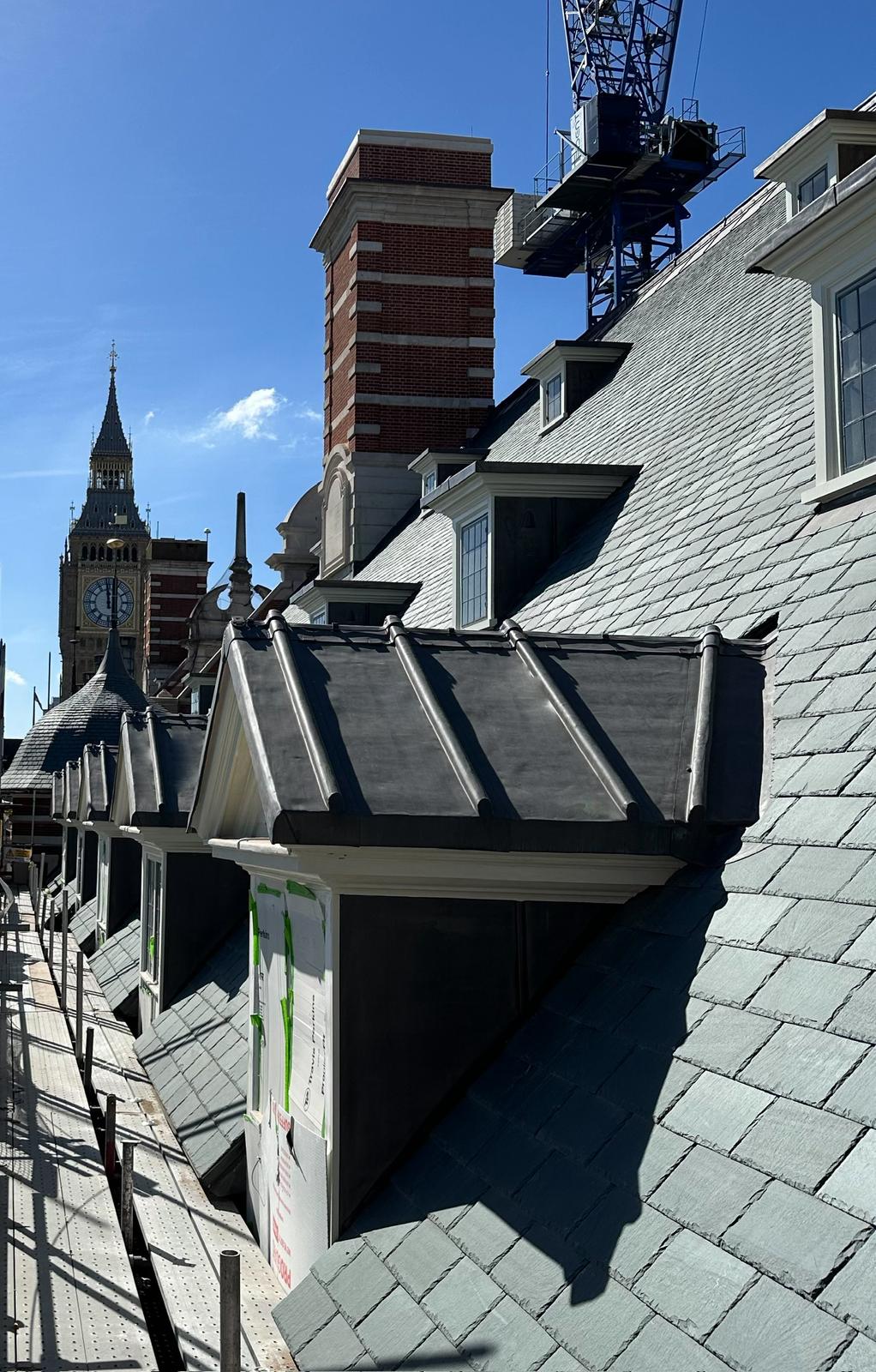 Lead dormers on slate roof